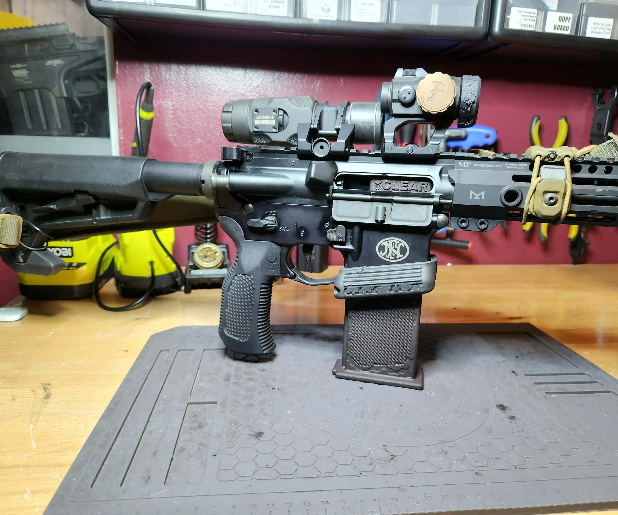 AR-15 with Bull Craft empty chamber block, flared magwell and Cowabunga pistol grip
